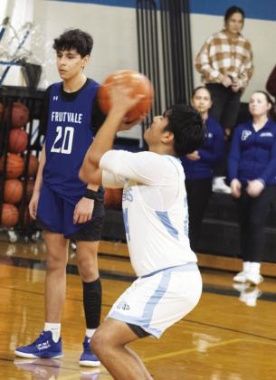 Edwin Castillo (24) shoots a free throw during the Eagles' game against Fruitvale Tuesday. Castillo scored seven points in the Eagles' 43-37 comeback victory. Photo by DJ Spencer