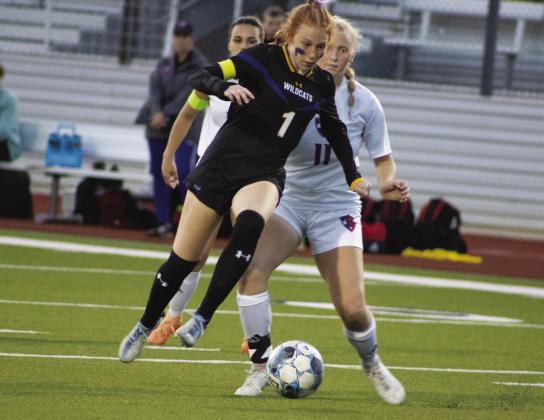 Anna Williams (1) moves the ball down the pitch during the Lady Wildcats' game against Bullard Tuesday. Williams was one of three Lady Wildcats to score a goal in their 3-1 victory in the Regional Quarterfinals. Photo by DJ Spencer