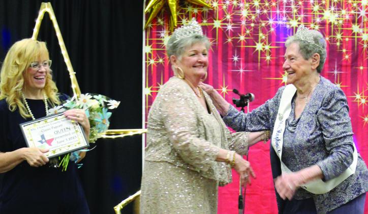 THE WINNER — Wilma Thompson, Ms. Hopkins County Senior Class 2021, crowns Jan Massey the 2023 queen. Pageant Director Dawna Pryor presents Massey with a certificate, trophy, a sash and flowers. See more photos on pg. 12. Staff photo by Faith Huffman