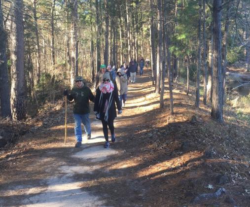 First Day Hikes, like this one at Daingerfield State Park, are quickly becoming a health and wellness tradition for many Texans. Both Cooper Lake State Park will offer such hikes on Jan. 1, 2024 for those intersted in participating. Photo submitted by Steve Killian, TPWD