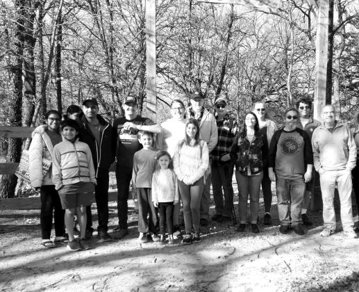Individuals and families participating in the First Day Hike at Cooper Lake State Park-South Sulphur Unit on Jan. 1, 2023, stopped to pose for a photo to commemorate the occasion. On Jan. 1, 2024, Texas State Parks will again be offering a myriad of hikes, walks, biking, and kayaking adventures. Photo submitted by Steve Killian, TPWD