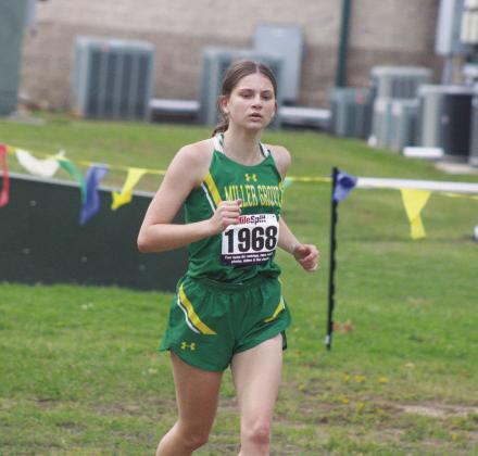 Audrey Yates races down the course during the District 23-1A cross country meet this past season. Yates was recently presented the Hornet Award as the hardest working female athlete at the Miller Grove ISD Awards Banquet last Tuesday.