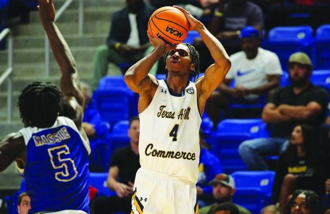 DEEP SHOT — Former A&M-Commerce basketball player Demarcus Demonia (4) shoots for three during a game last season. Demonia recently signed a professional contract with the Arkadia Traiskirchen Lions of the Austrian Basketball Superliga. Submitted Photo