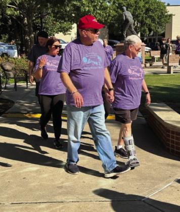 Walking to show support for Terrific Tuesdays at the Walk to Remember are Jim and JoBeth Thompson of Sulphur Springs.