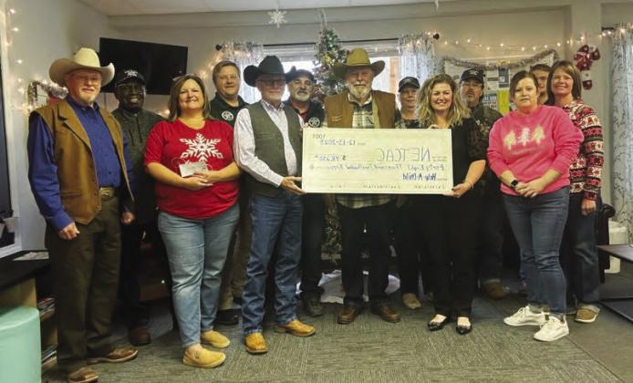 Wade Bartley and wife Jan, Jim Wright, Franklin County Constable Brantin Carr, members of the Masonic lodges in Hopkins and Franklin counties, and others were in attendance for the presentation of $48,250 raised at the Help-AChild benefit to Northeast Texas Child Advocacy Center. Submitted photo
