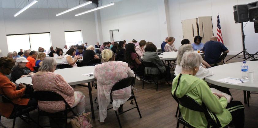 Senior citizens and community members packed this meeting area in the new senior citizens activity center during the opening ceremony.