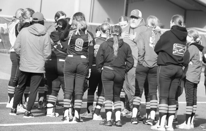 The North Hopkins Lady Panthers listen to head coach Phillip Mathis during recent action. The Lady Panthers lost their Wednesday road game to the Bland Lady Tigers 6-1, dropping to 4-1 in district and 9-4-1 overall. Photo by DJ Spencer