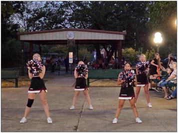 (Above) Cumby Collegiate Junior High cheerleaders entertained the crowd with jazzed-up pom-pom routines during the post-parade program at the Cumby City Park Monday evening.