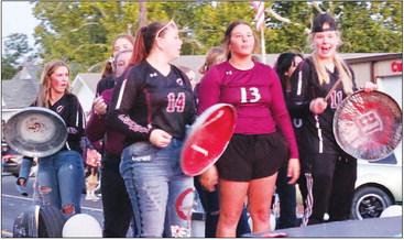 Some of the Lady Trojans kicked off 2023 Homecoming Week with a bang in an enthusiastic drum solo on improvised equipment.