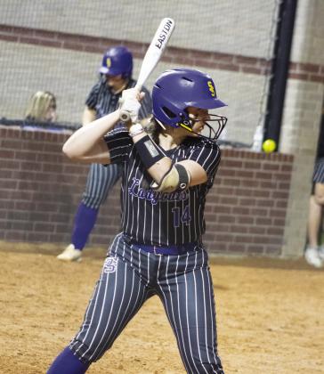 Hannah Speed (14) takes her stance in the batter's box during the Lady Wildcats' game against Mabank Tuesday. Speed batted 3/5, scored three runs, and an RBI in the Lady Wildcats' 18-13 victory, including a solo home run in the sixth inning.