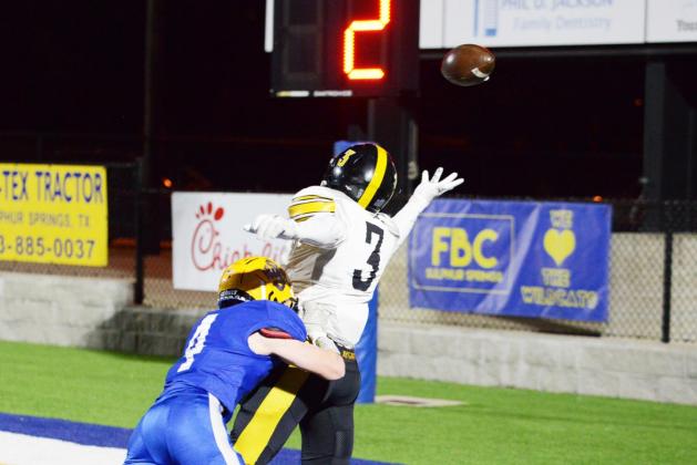 Colt Silman (4) deflect a pass to a Forney receiver.