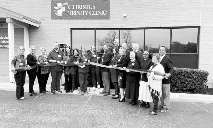 CHRISTUS officials join the staff March 20 as they celebrate the opening of CHRISTUS Trininty Clinic in Winnsboro, the new primary care clinic located at 719 West Coke Road in Suite 3 at Medical Office Building 1 in Winnsboro. Courtesy Photo