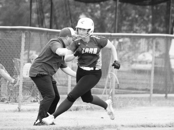 Emma Neal (15) barrels towards home plate during recent action. Neal recorded two hits in the Lady Bears' 19-0 loss to Alba-Golden last Tuesday. Photo by DJ Spencer