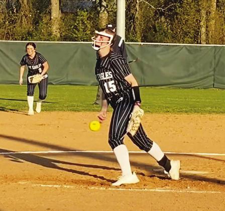 Lexie Rainey (15) delivers a pitch during the Lady Eagles' game against Alba-Golden Tuesday. Rainey earned the win in the circle, striking out nine batters. She also recorded a hit and scored two runs on offense. Courtesy/ Como-Pickton CISD