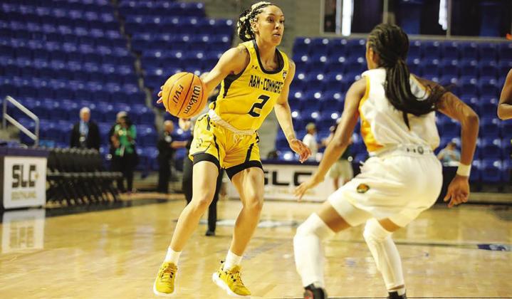 RUNNING OFFENSE — Mia Deck (2) tries to move the ball past a defender during a game last season. The Texas A&amp;M-Commerce women's basketball team has released their conference schedule for the 2023-24 season. Submitted Photo