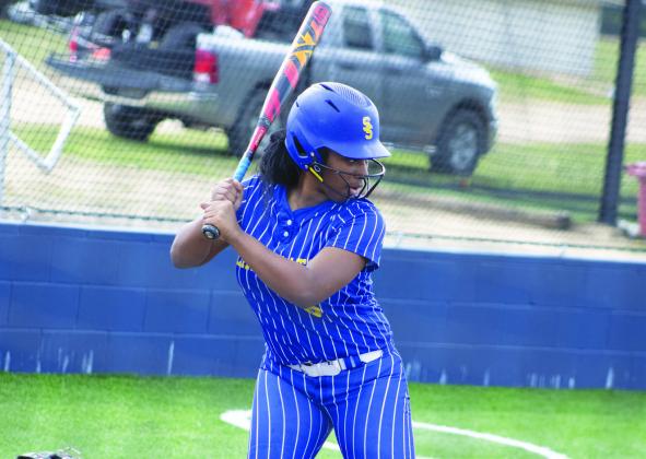 KK Montgomery (6) takes her stance in the batter's box during recent road action. Montgomery batted 2/3, scored two runs, and recorded two RBIs in the Lady Wildcats' 10-0 victory over Pittsburg Tuesday, including a solo home run in the fifth inning that capped off the win. Photo by DJ Spencer