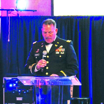 Jonathan Newsom announces the Veteran of the Year during the 2023 Hopkins County Feedom Ball, held May 20, at Hopkins County Regional Civic Center.