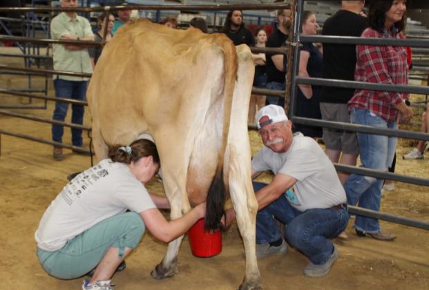 One of five balloon pilot teams particiated in the Dairy Festival Milking Contest June 10 in the Civic Center Arena.