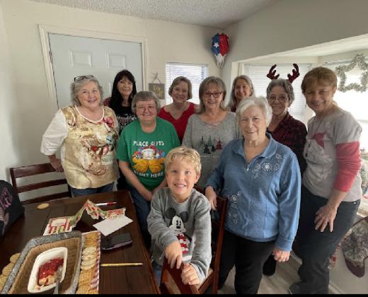 Members of the Sassy Sista’s recently gathered at a Como residence for their annual Christmas party. Pictured from left are (back row) Holly Ingram, Sharon Condarco and Nora Roberts; (middle row) Vicky Gillispie, Coral Ware, Suzanne Tanksley, Christine Henderson and Diane Wilson; and (front row) Shirley Zaeske and Cooper Ross Gillispie. Submitted photo
