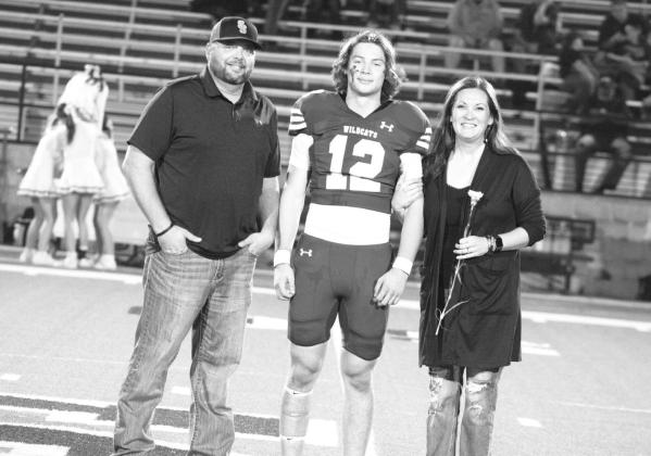 Braxton Wall (12) was escorted by his parents, Danny and Charla Wall.