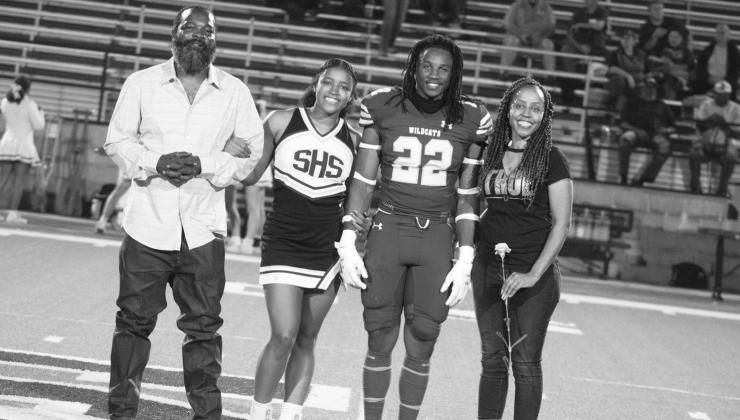 Cameron Jefferson (22) was escorted by his parents, BJ and Kayla Jefferson, along with his sister, Trinity Jefferson (second from left). Photos by DJ Spencer