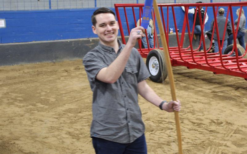 Eli Ham of Sulphur Bluff received a blue ribbon and third in his class for the longbow he crafted. Courtesy/SBISD