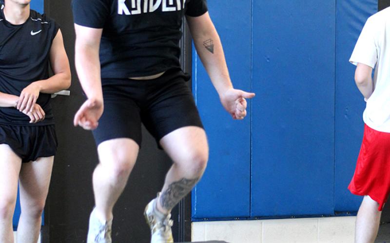 Student athletes run drills this week at The Edge summer conditioning program at Sulphur Springs High School.