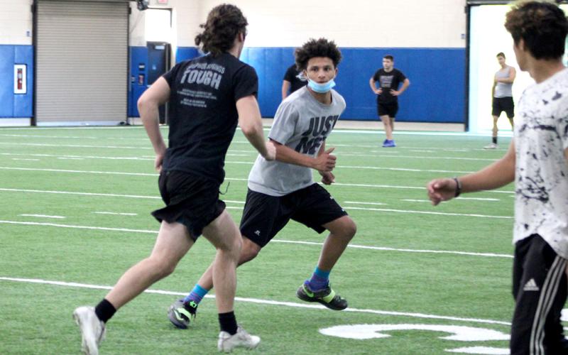 Student athletes run drills this week at The Edge summer conditioning program at Sulphur Springs High School.
