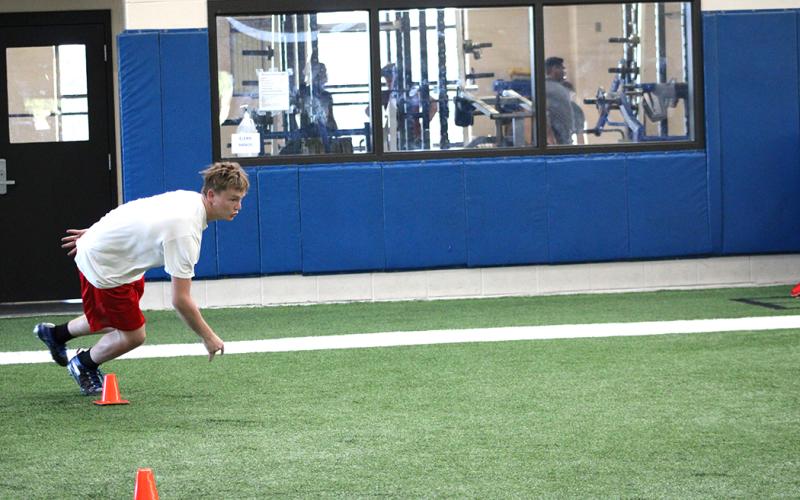 Student athletes run drills this week at The Edge summer conditioning program at Sulphur Springs High School.
