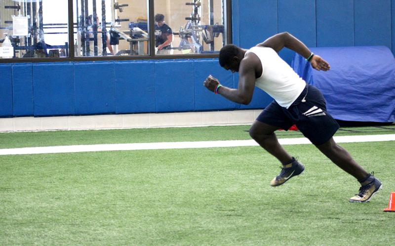 Student athletes run drills this week at The Edge summer conditioning program at Sulphur Springs High School.