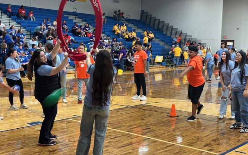 Key Club members and SSHS sponsors assist in Special Games Day on March 4.