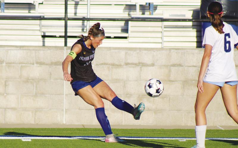 Jolea Moore (10) kicks the ball during the Lady Wildcats' Bi-District Playoff Game against Lindale this past season. Moore made the Texas High School Coaches Association Academic All-State Team for her performance in the classroom throughout high school. Staff Photo by DJ Spencer