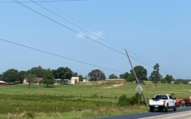 Dedicated workers engaged in storm recovery. Hopkins County Texas.