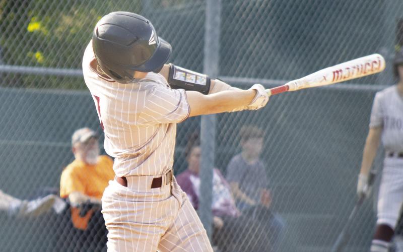 Cumby's Jayden Evans (1) records a hit during a game against Yantis this past season. Evans earned First-Team All-District honors for his play in the infield during his senior season.