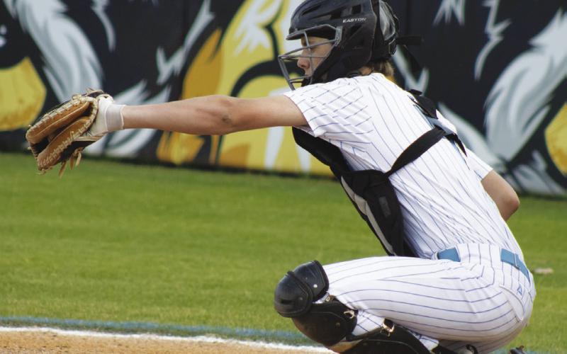 Como-Pickton's Ben Brewer (4) catches a pitch during a game against Yantis this past season. Brewer earned District 18-2A Defensive Player of the Year honors following a strong junior season.