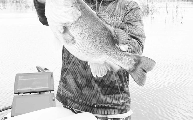 Fishing guide Jason Conn displays the 9.04 pounder he caught at Bois d’Arc Lake on April 24. TPWD fisheries scientists are doing genetics testing on scale samples from the fish to determine if it is one of the 2,000-plus advanced growth Toyota ShareLunker fingerlings released into a 10-acre brood pond in 2019. Courtesy Photo/ Jason Conn