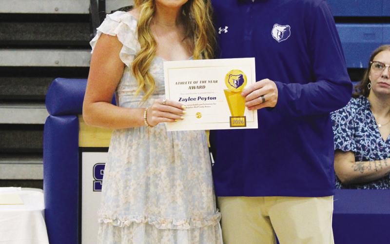 Zaylee Peyton (left) was a co-recipient of the Female Athlete of the Year Award at Sulphur Bluff's Athletic Banquet Tuesday. Coach Casey Riddle presented the award. Peyton was also awarded the Girls Basketball MVP and was a co-recipient of the Volleyball MVP Award.