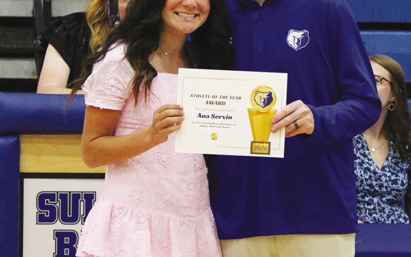 Ana Servin (left) was also a co-recipient of the Female Athlete of the Year Award at Sulphur Bluff's Athletic Banquet Tuesday. Presenting the award is Coach Casey Riddle.
