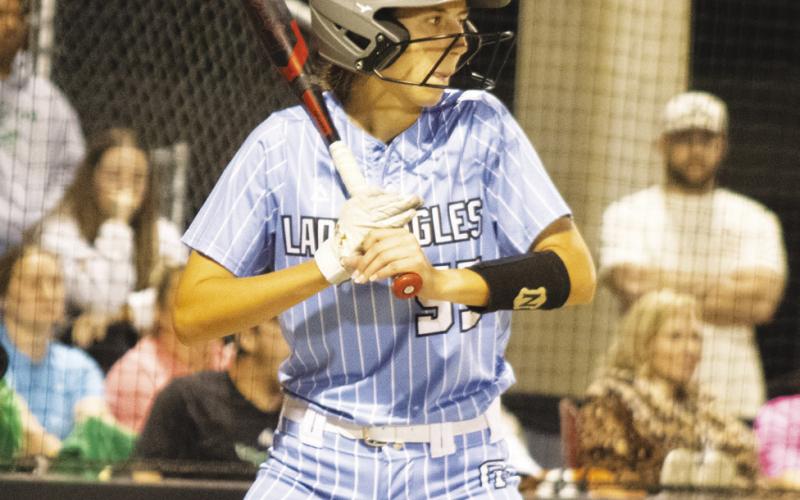 Sarah Corley (55) takes her stance in the batter's box during Game 3 of the Lady Eagles' Area Playoff series against Overton Saturday. Corley batted 2/3, scored a run and recorded an RBI in the Lady Eagles' 5-0 victory.