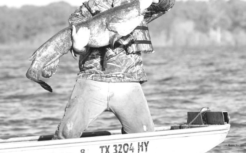Boaters should always wear their life jackets when the vessel is underway. It’s also a good idea to don a PFD when running trotlines or other passive fishing devices where you are apt to encounter large fish, especially during windy conditions. Photo by Matt Williams
