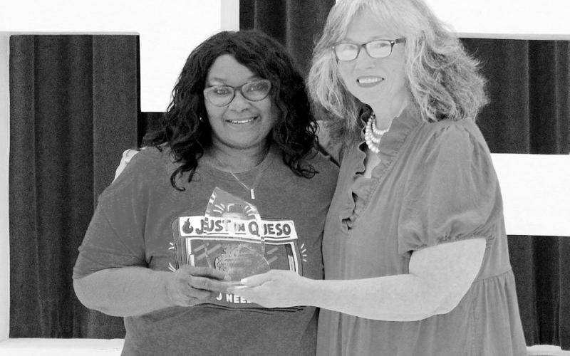 Como-Pickton CISD Superintendent Lydia Walden presented Auxiliary Staff of the Year to cafeteria attendant Carla Slaughter during the CPCISD Staff awards May 6.