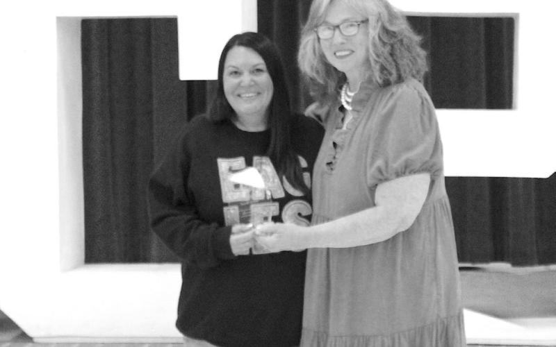 The Eagle Support Staff of the Year award is presented to Danielle Rutledge by Como-Pickton Superintendent Lydia Walden.