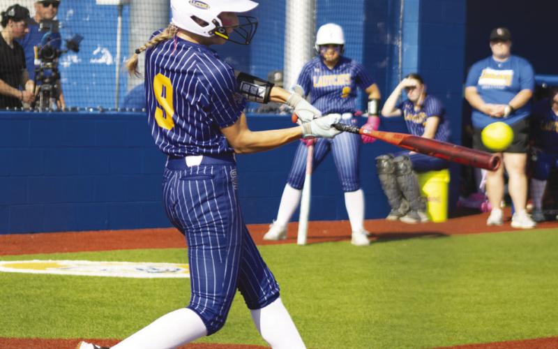 Brailie Blevins (9) hits the ball during the Lady Wildcats' Bi-District Playoff Series against Wills Point this past season. Blevins earned First-Team All-District honors for her play in the infield during her junior season.