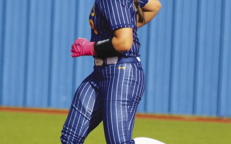 Allison Frazier (8) races to second base during the Lady Wildcats' Bi-District Playoff Series against Wills Point this past season. Frazier earned First-Team All-District honors for her play in the outfield during her junior season. Staff Photos by DJ Spencer