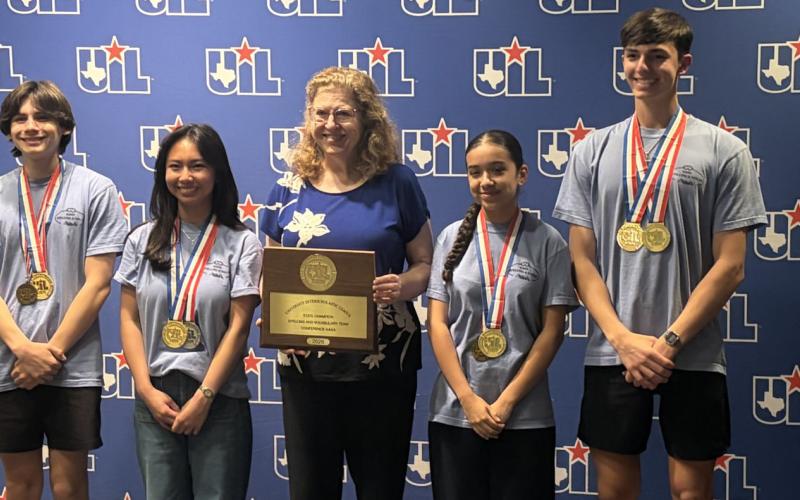 The SSHS spelling team. (From left) Charlie Knechtel, Abigail Bautista, their coach Gail Herman, Kimberly Negrete and Brooks Burgin.
