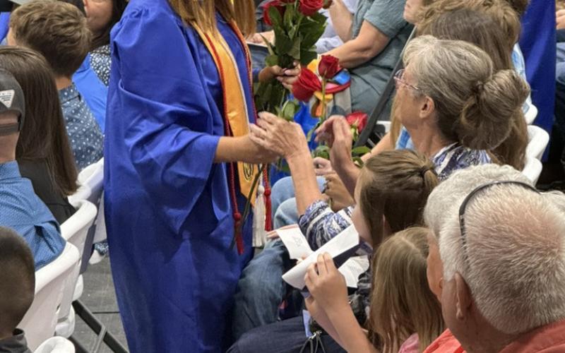 Lani Dean thanks friends and family during the ceremony of the roses, part of Saltillo Senior Class of 2026's commencement ceremony. Photo by Jonathan Hopper