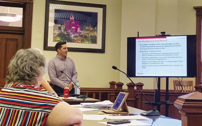 Jacob Korte, project development manager for Tenaska, presents information during Hopkins County Commissioners Court about a possible carbon capture and storage (sequestration) project potentially headed to Hopkins County. Staff photo by Faith Huffman