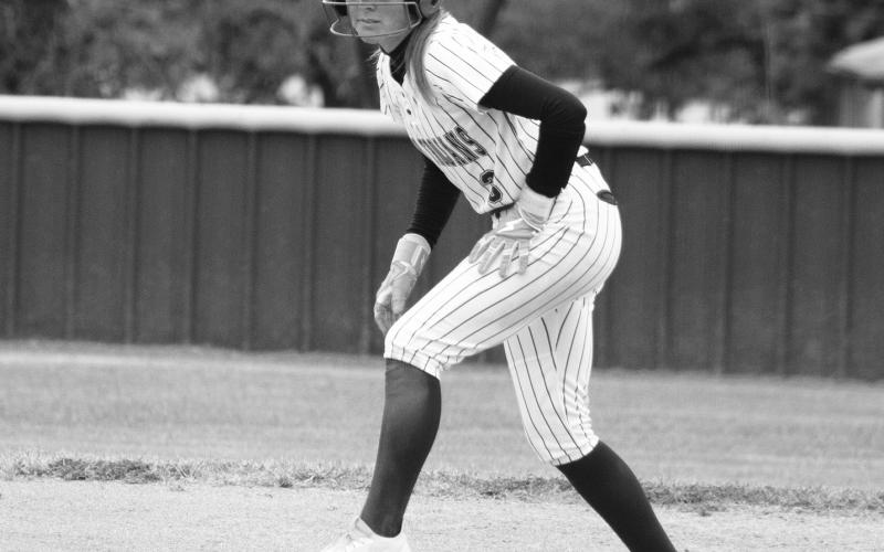 Ella Horne (3) takes a lead-off from second base during a game against Hawkins this past season. Horne earned Second-Team Academic All-State honors from the Texas High School Coaches Association for her performance in the classroom throughout high school. Staff Photo by DJ Spencer