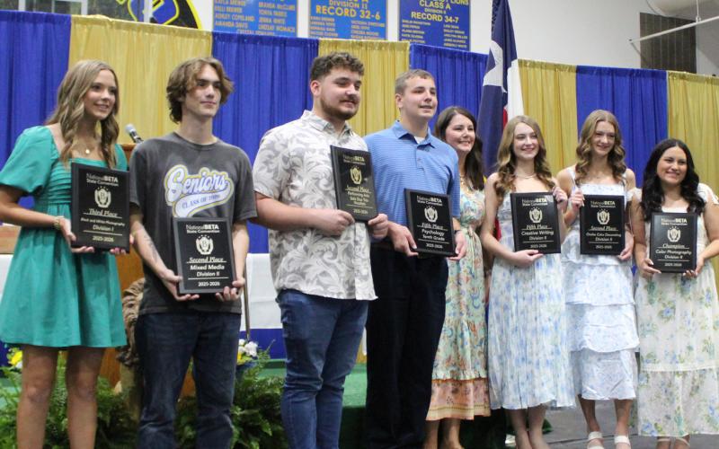 Saltillo Beta Club sponsor Jennifer Ricketson postes with the seven club members who places at the state meet. A total of 36 club members competed, but only Beta members ranked in the top five in their event qualified to compete in the national Beta competition in Nashville June 16-20.