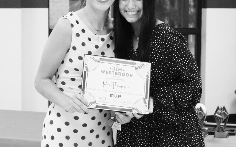 Tatum Thompson (left) received the Jim Westbrook MVP Award for softball at North Hopkins' Athletic Banquet Monday. Coach Daylee Fite presented the award.